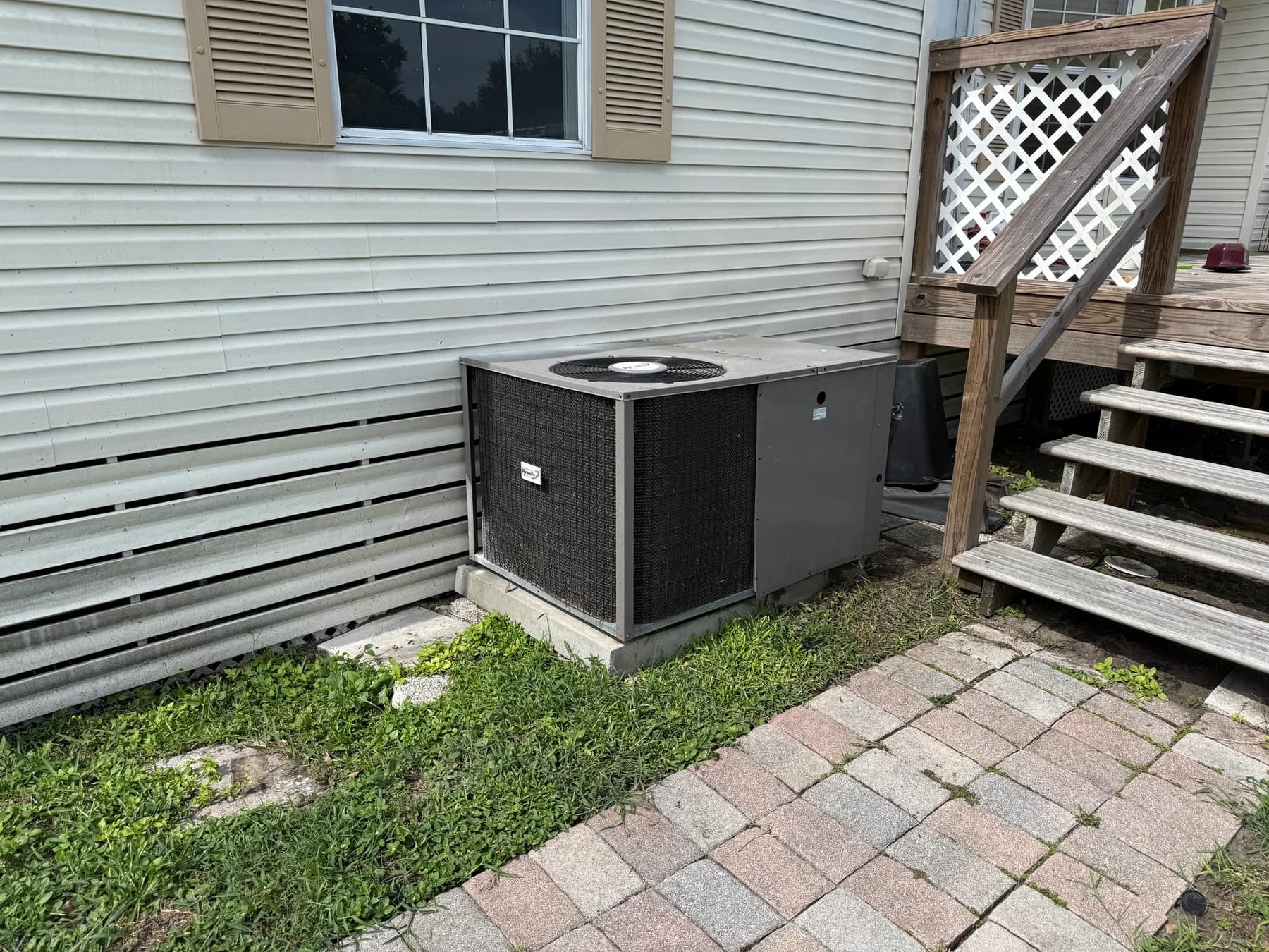 Two professionally installed outdoor HVAC systems