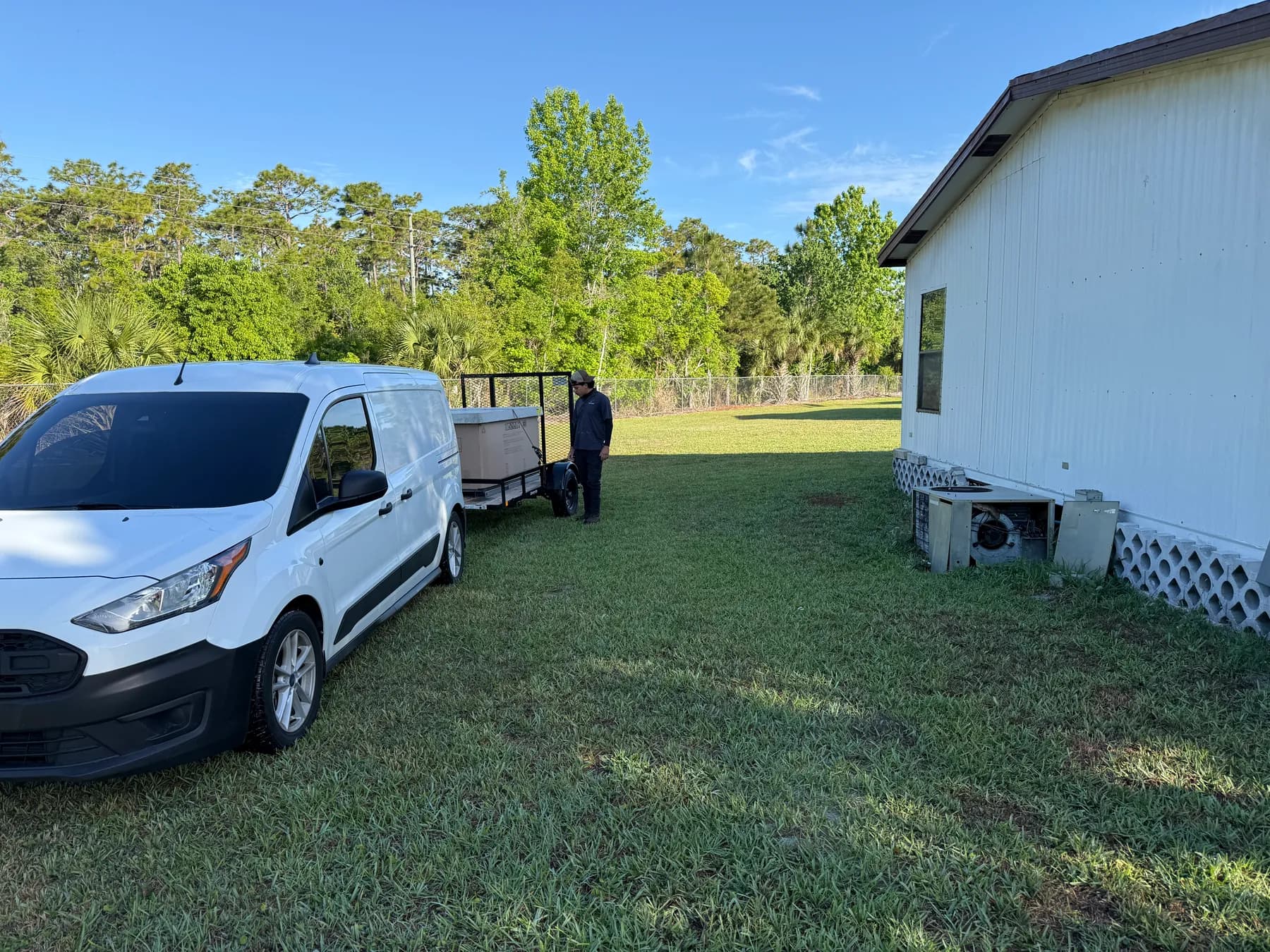 Universal A/C Services van arriving at a Central Florida property
